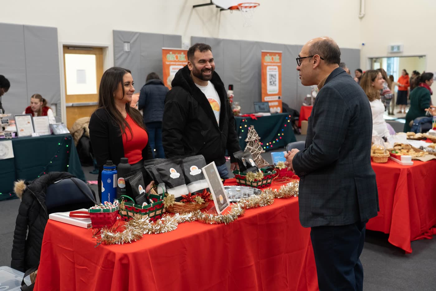Chatting with vendors at a decorated table